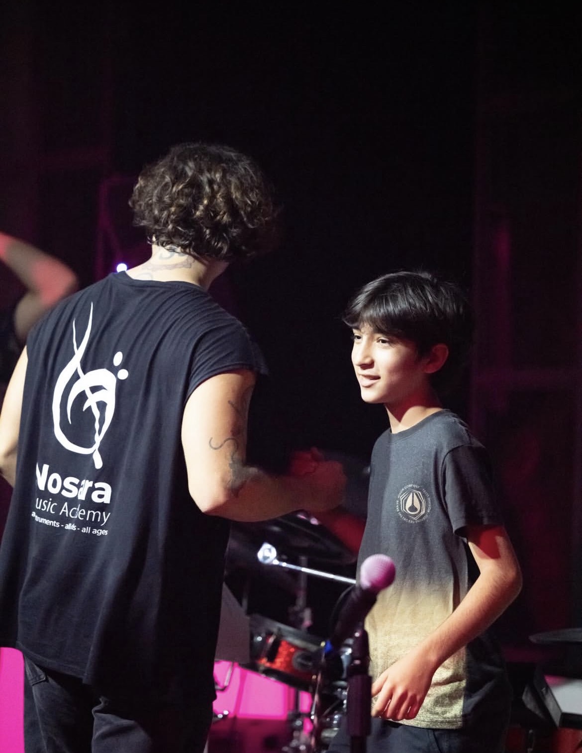 Special moment between student and teacher at Nosara Music Academy